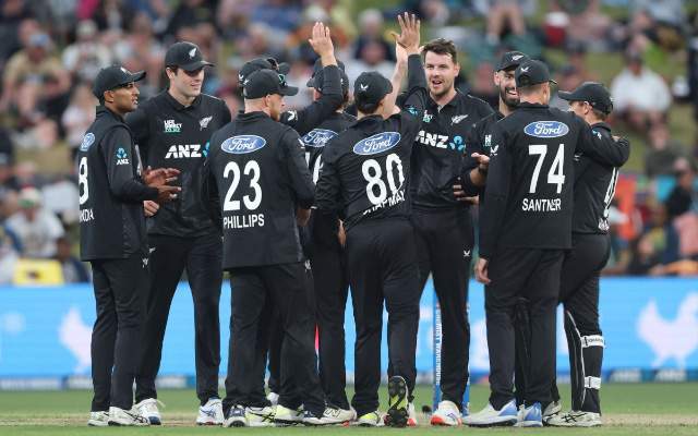 NZ team in a huddle