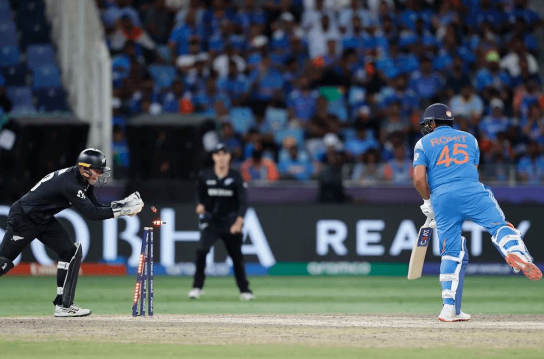 Rohit Sharma was stumped by Tom Latham off Rachin Ravindra 